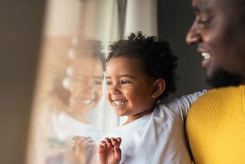 Benchmark Income Group Helping People Father Daughter Looking Out Window Benchmark Income Group Helping People Father Daughter Looking Out Window